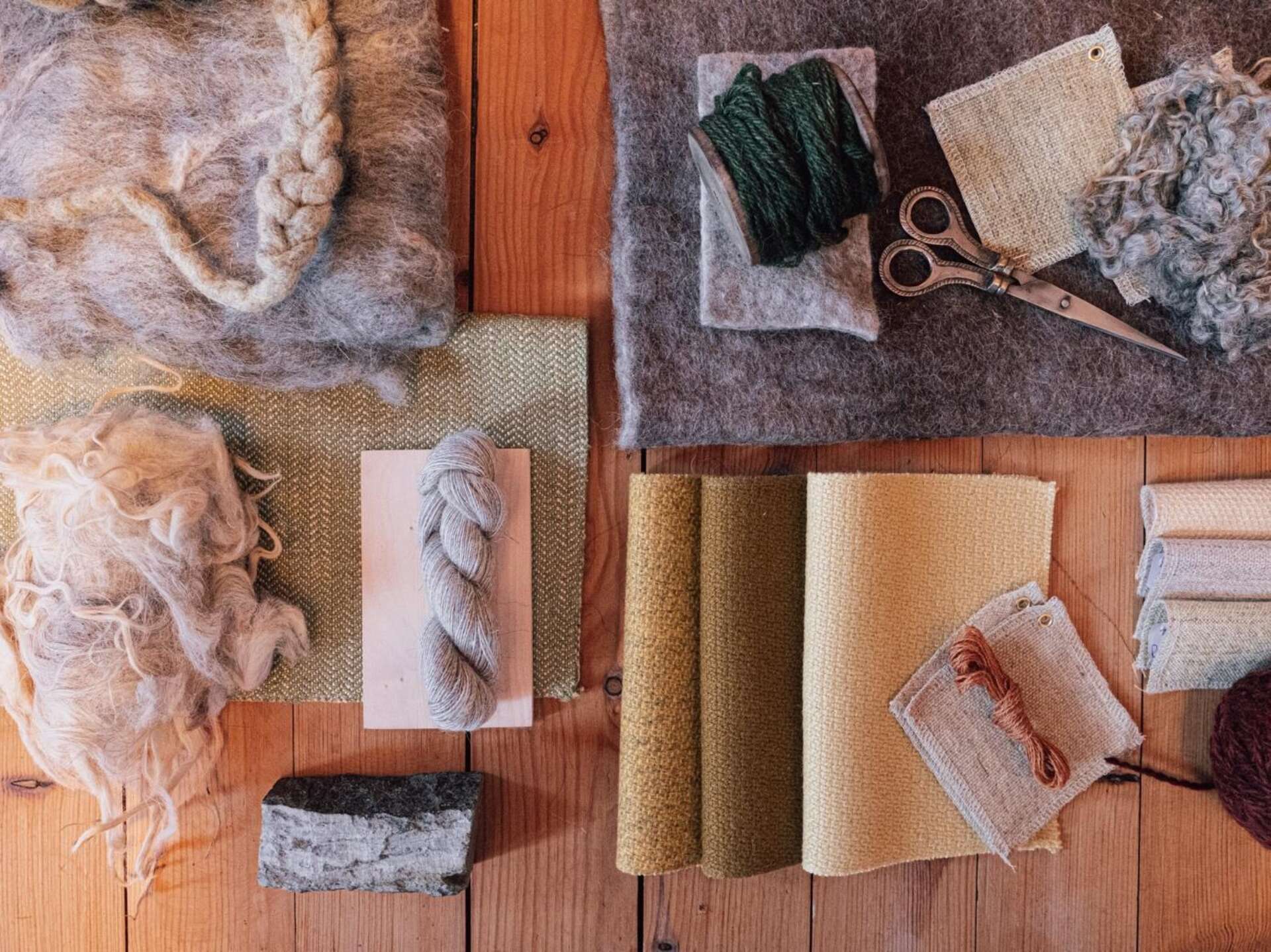 A palette of untreated wool fibres material samples and prototypes that form the starting point for exploring wool in architectural applications